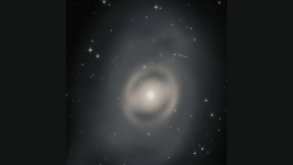 Hubble Gökadayı Hayalet Gibi Bir Pusun İçinde Gördü